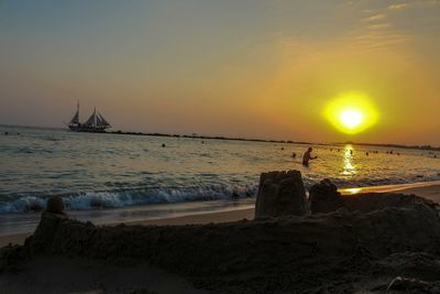 Scenic view of sea at sunset