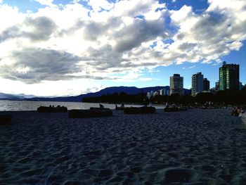 Panoramic view of sea and buildings against sky