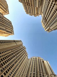 Low angle view of skyscrapers against sky