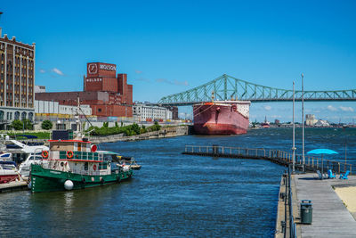 View of bridge over sea against blue sky