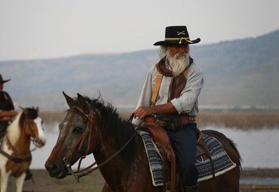 Man riding horse