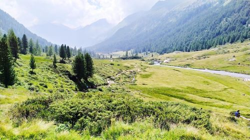 Scenic view of field against mountains