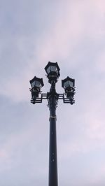 Low angle view of statue against sky