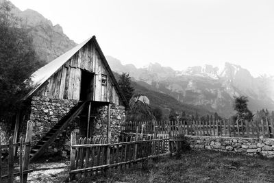 Built structure on mountain against sky