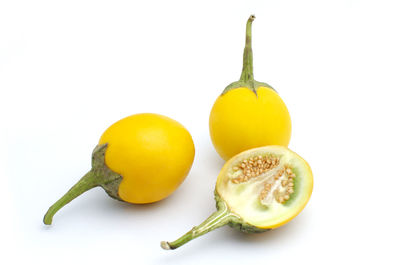 Close-up of lemon against white background