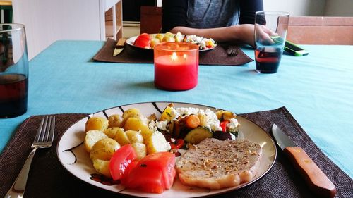 Close-up of breakfast served on table