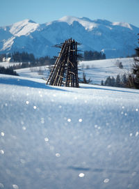 Snow covered mountain against sky