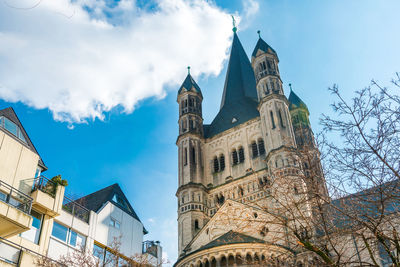 Low angle view of clock tower against sky