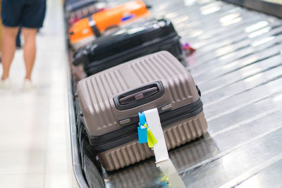 Luggage on conveyor belt at airport