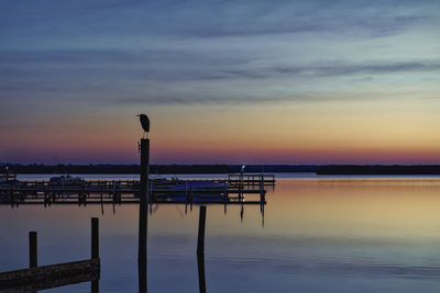 Scenic view of sea against sky during sunrise 