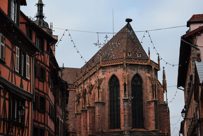 Low angle view of old building against sky