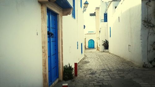 Narrow alley along buildings