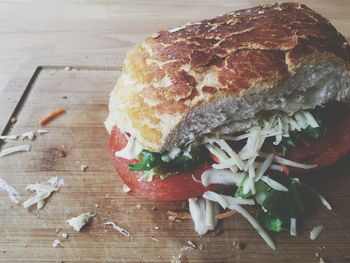 Close-up of pepperoni sandwich on cutting board