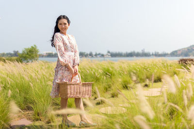 Woman standing on field