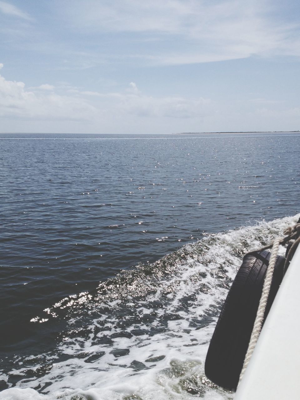 sea, water, horizon over water, sky, scenics, tranquil scene, beauty in nature, tranquility, rippled, nature, wave, waterfront, seascape, idyllic, blue, surf, day, nautical vessel, cloud, remote