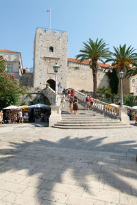 Group of people in front of building