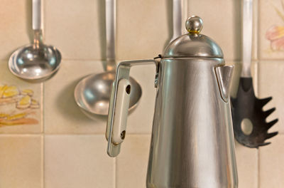 Close-up of faucet in bathroom