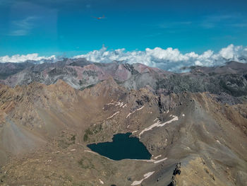 Aerial view of volcanic landscape against sky