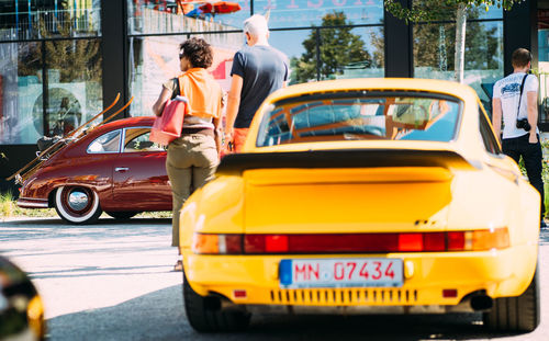 Rear view of people on street