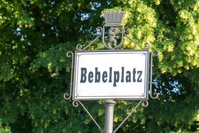 Street name sign of bebelplatz formerly and colloquially the opernplatz, square in mitte district