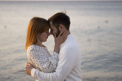 Kaliningrad, russia. young couple in love on the seaside