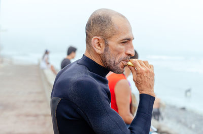 Side view of man on beach