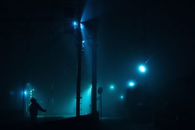 Silhouette people at night