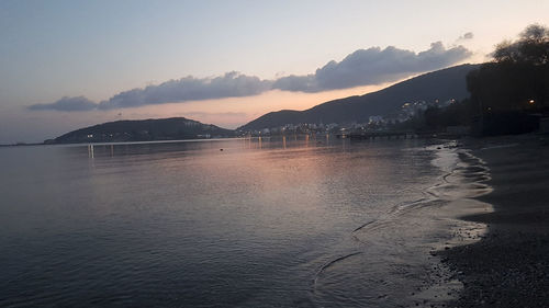 Scenic view of sea against sky at sunset