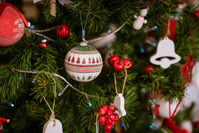 Beautiful christmas background, christmas toys and balls on the new year tree.