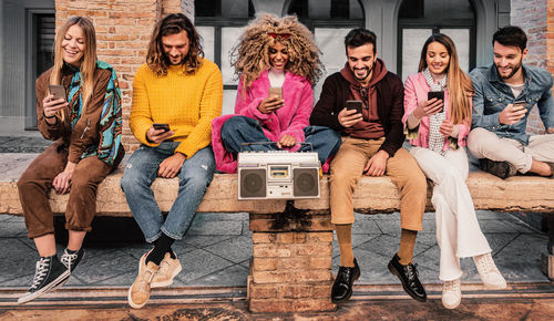 Group of people sitting outdoors