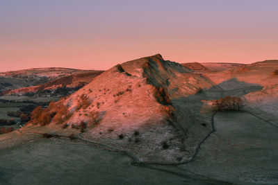 Scenic view of mountain against sky during sunset