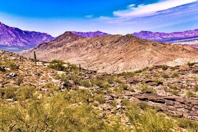 Scenic view of rocky mountains against sky