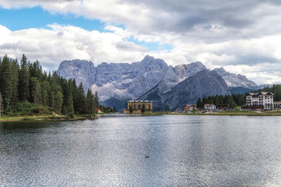 Scenic view of lake and mountains against sky