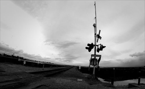 Road against cloudy sky