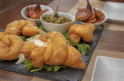 High angle view of serving food in plate on table