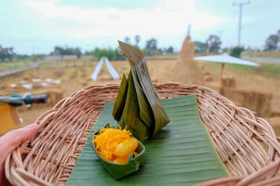 Close-up of thai dessert in basket on table