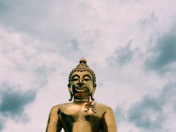 Low angle view of statue against sky