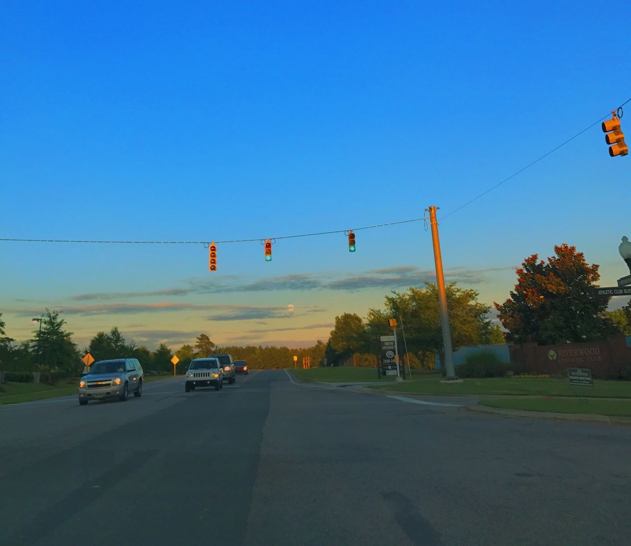 car, transportation, road, land vehicle, mode of transport, street, tree, clear sky, blue, outdoors, no people, cable, day, sky, nature