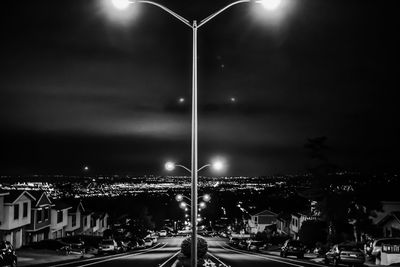 Illuminated street lights at night