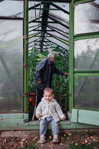 Full length portrait of boy standing outdoors