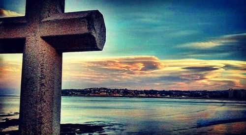 Scenic view of sea at sunset