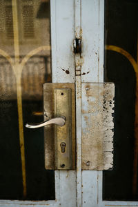 Close-up of padlock on door