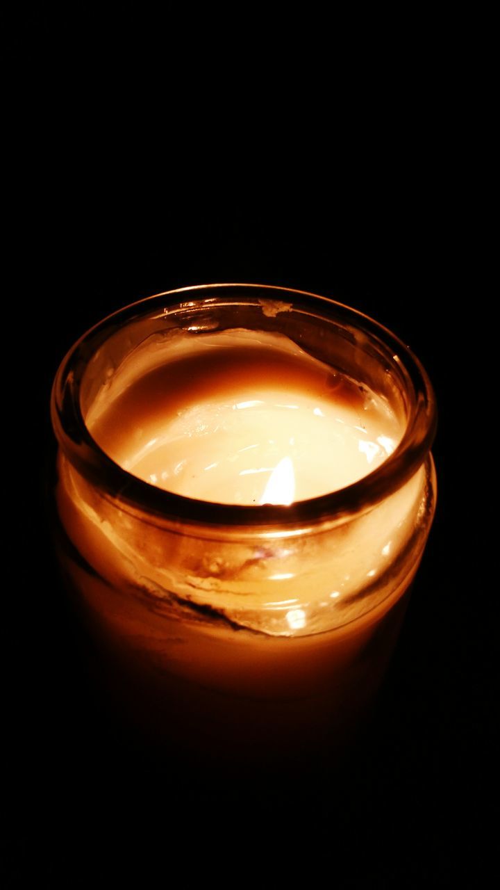 studio shot, burning, flame, black background, illuminated, close-up, glowing, heat - temperature, candle, copy space, indoors, lit, dark, still life, fire - natural phenomenon, drink, darkroom, candlelight, fire, orange color
