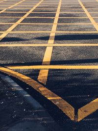 Full frame shot of road with yellow markings