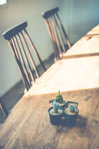 High angle view of empty chair on table