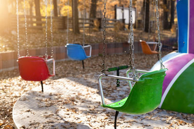 Close-up of empty swing in playground