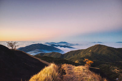 Scenic view of mountains against sky during sunset