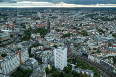 High angle view of buildings in city against sky