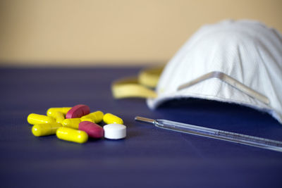 Close-up of multi colored pencils on table