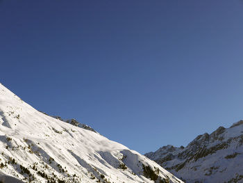 Scenic view of the snow capped mountains on a clear day